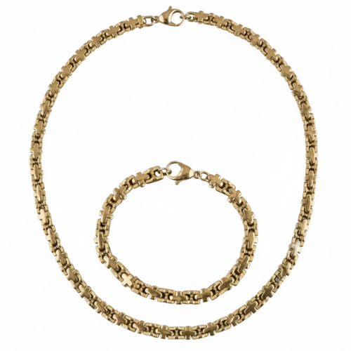 Gold chain necklace and bracelet set on a white background