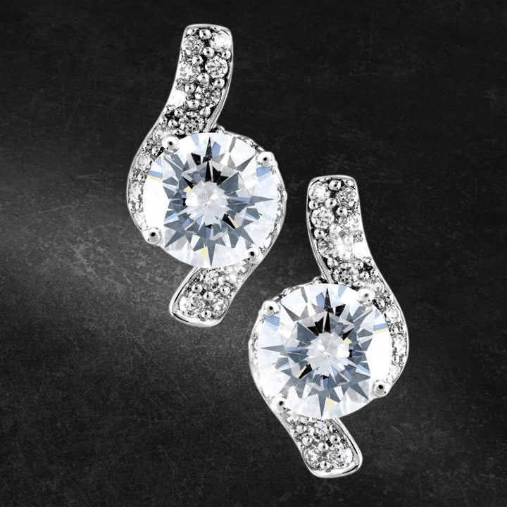Sterling silver Sonata Earrings for female with a sparkling round central stone surrounded by smaller stones in a swirl design, elegant jewelry for special occasions.