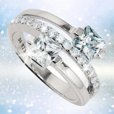Sterling Silver Miami Ring for female featuring two large square-cut clear stones and a row of smaller round stones along one band for an elegant jewelry design.