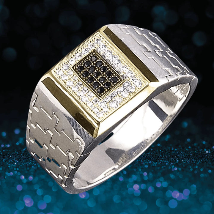 Puzzle Men's Ring in sterling silver with two-tone plating, featuring a textured band and a square center adorned with black and white stones, designed for men’s jewelry collections.