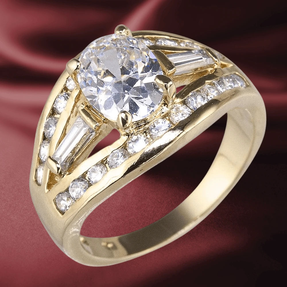 Amora Ring featuring a sterling silver base with gold plating, adorned with a large round center stone and multiple smaller clear accent stones, designed for women’s jewelry.