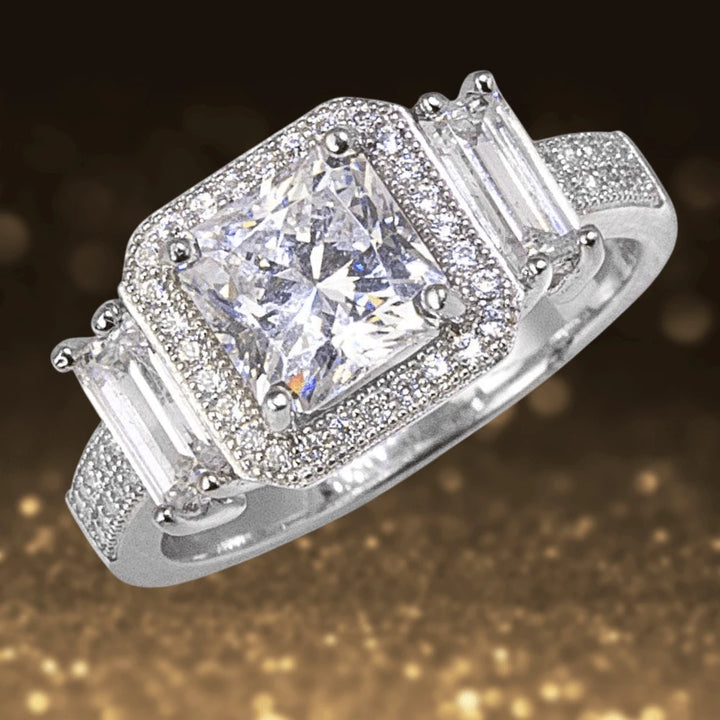 Sterling Silver Park Lane Ring for female with rhodium plating, featuring a large square center stone surrounded by smaller diamonds and additional rectangular side stones.