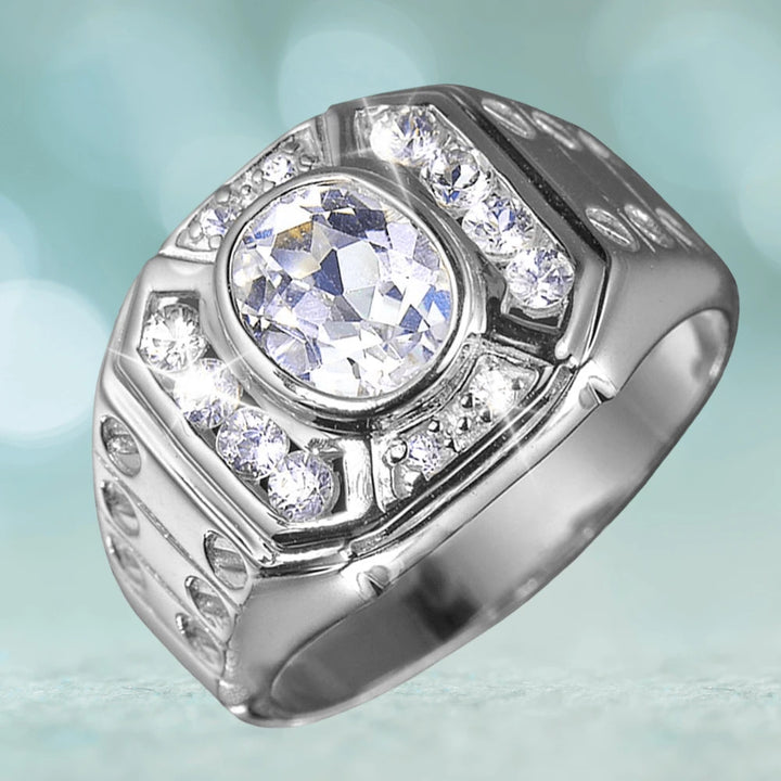 Treviso Rhodium Men's Ring crafted in sterling silver, featuring a central sparkling gemstone surrounded by smaller clear stones for a bold, elegant jewelry statement.