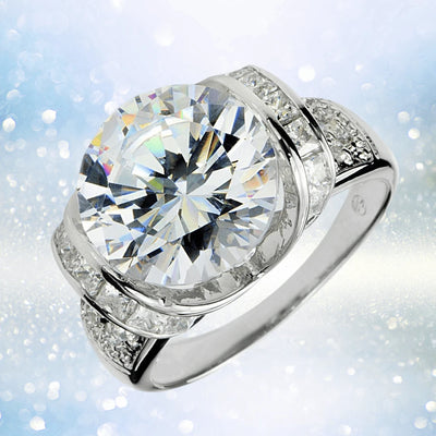 Ultima Ring featuring a large round-cut center stone set in sterling silver with rhodium plating, designed for women, showcasing a modern and elegant jewelry style.