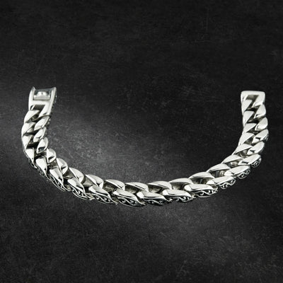 Scroll Steel Necklace for men crafted from polished stainless steel, featuring a bold, twisted chain design ideal for stylish and durable jewelry collections.