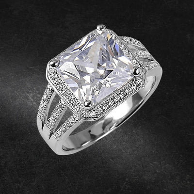 Manhattan Ring featuring a large square-cut center stone set in sterling silver with rhodium plating, designed for women, accented with pavé-set smaller stones on the band.