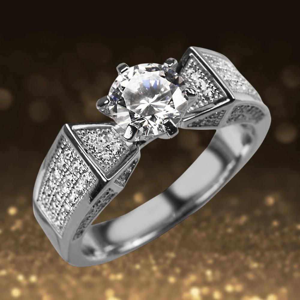Star Solitaire Ring featuring a sparkling round center stone, crafted in sterling silver with rhodium plating, designed for a refined and elegant female style.