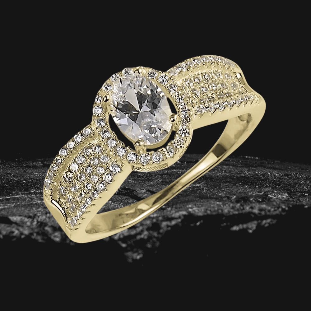 Carolina Ring featuring a sterling silver base with gold plating, adorned with a large central clear gemstone and multiple smaller sparkling stones, designed for females.