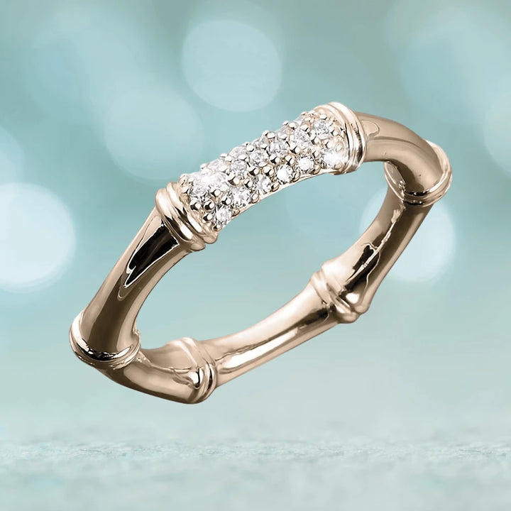Bamboo Rose Gold Ring crafted from sterling silver with a bamboo-inspired design and a cluster of sparkling clear stones, elegant jewelry for female wearers.