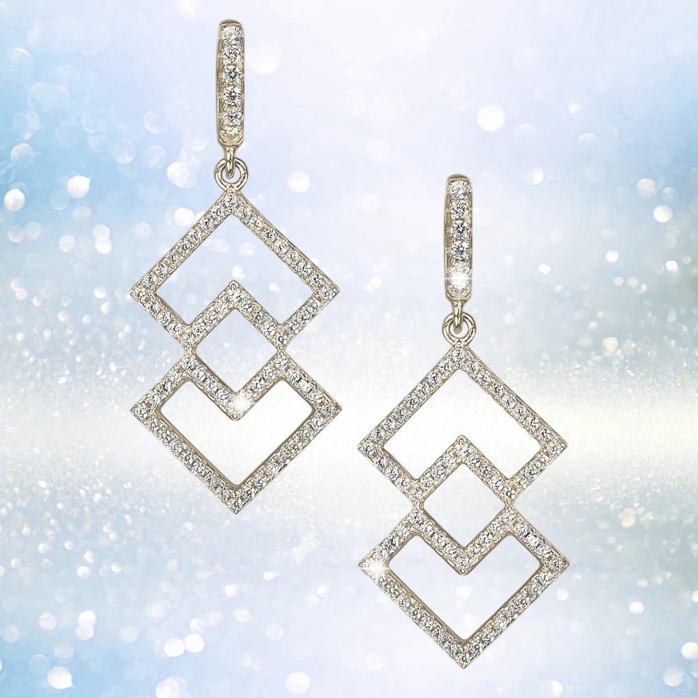 Times Square Earrings featuring interlocking geometric shapes crafted from sterling silver with gold plating, adorned with sparkling stones for elegant female jewelry.