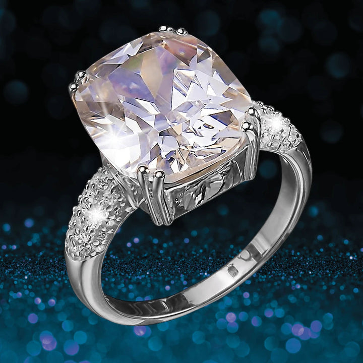 Dazzle Ring Rhodium featuring a large sparkling gemstone set in sterling silver with rhodium plating, designed for women’s elegant jewelry collections.