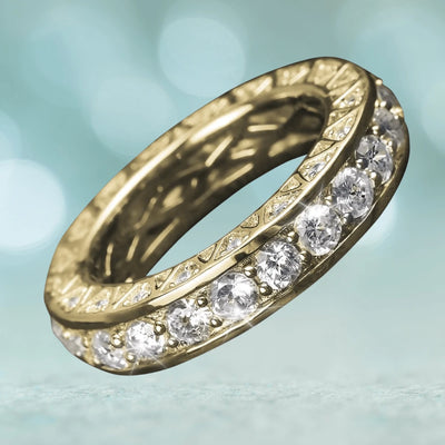 Portofino Yellow Gold Ring crafted from sterling silver with gold plating, featuring a row of sparkling clear stones, designed for women’s elegant jewelry collection.