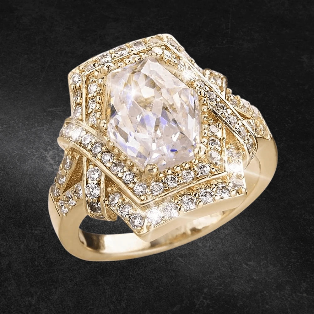 Catalina Ring featuring a sterling silver base with gold plating, adorned with a large faceted clear gemstone and surrounded by smaller sparkling stones, designed for women.