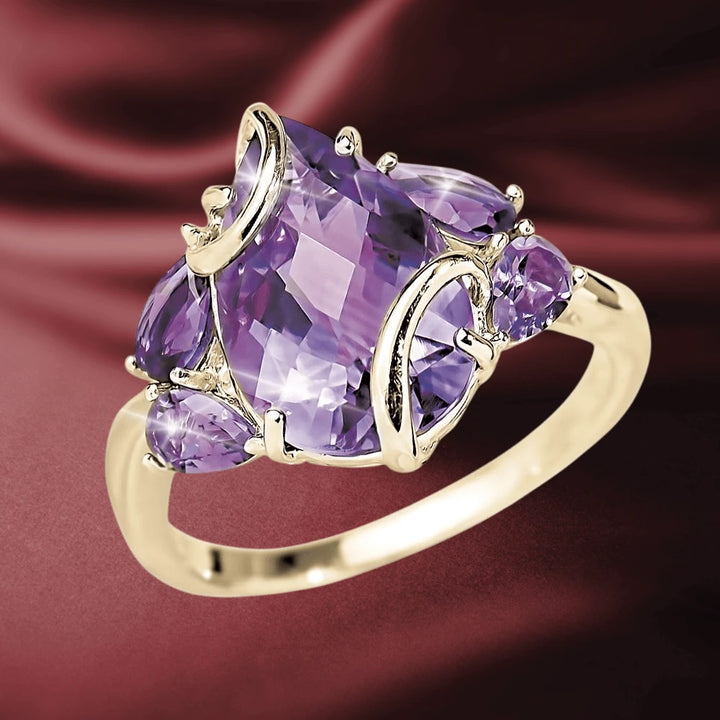 Amethyst Vine Ring featuring a large faceted purple amethyst gemstone set in a sterling silver band with gold plating, designed for women’s elegant jewelry collections.