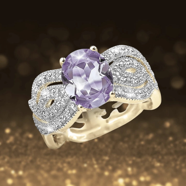Provence Lavender Ring featuring a sterling silver band with gold plating, showcasing an oval lavender gemstone surrounded by intricate sparkling accents, designed for women.