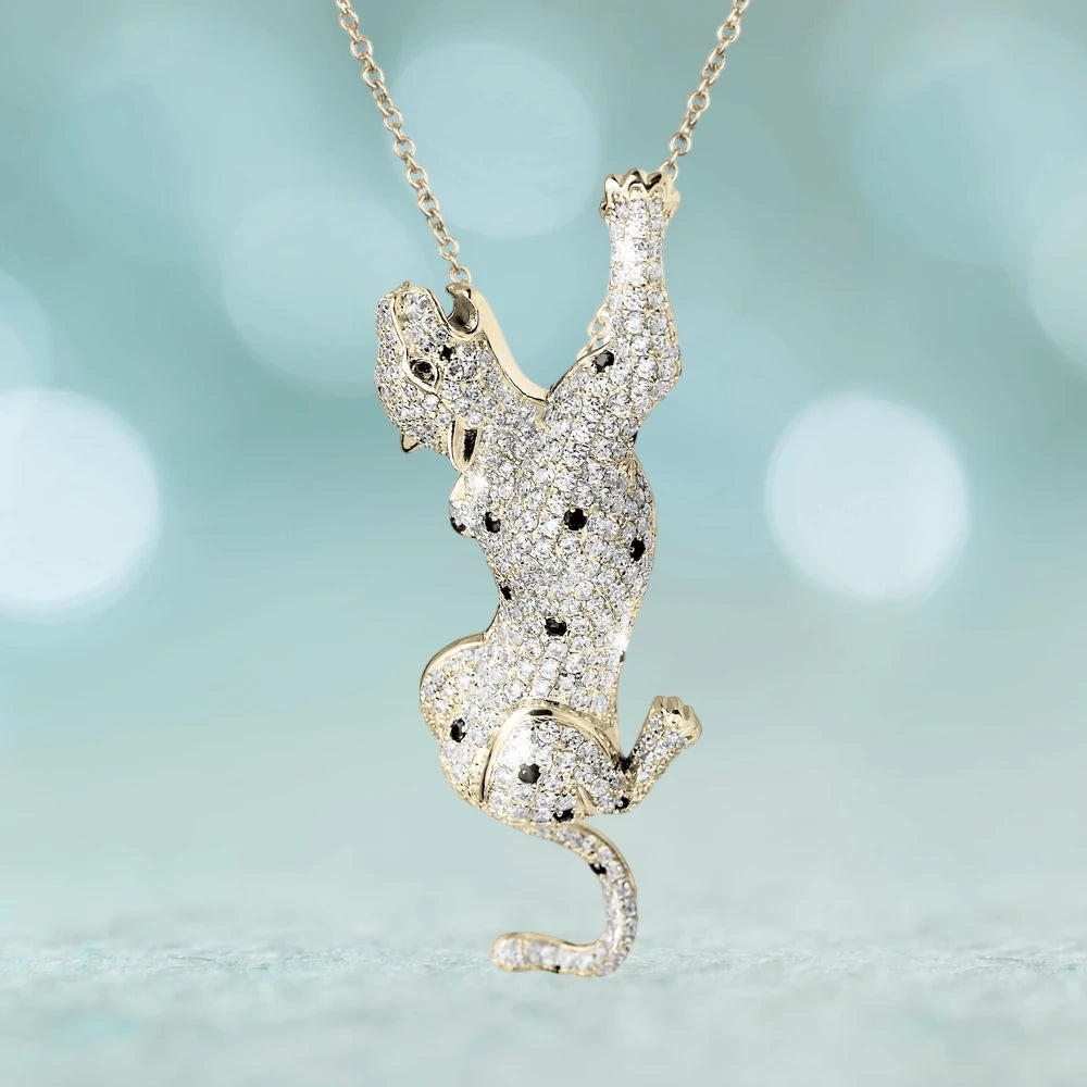 Bella 2-In-1 Pendant featuring a sterling silver and gold-plated design in the shape of a playful cat adorned with sparkling crystals, elegant jewelry for women.