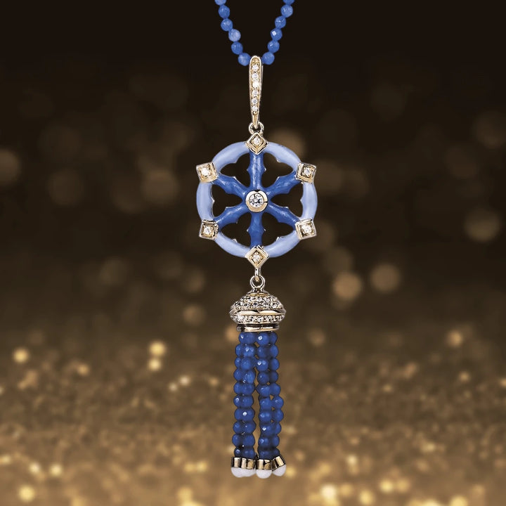 Marina Pendant featuring sterling silver with gold plating, adorned with blue beads and sparkling accents, designed as a stylish necklace for women’s jewelry collections.