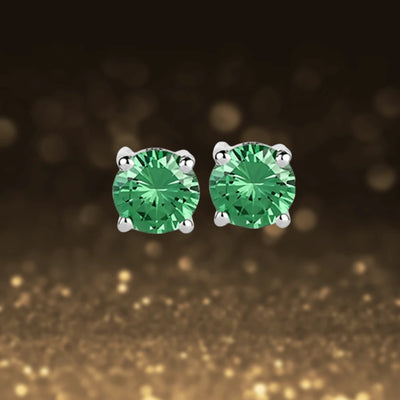 Brilliant Birthstones Earrings May featuring round green stones set in sterling silver with rhodium plating, designed for women’s elegant jewelry collections.