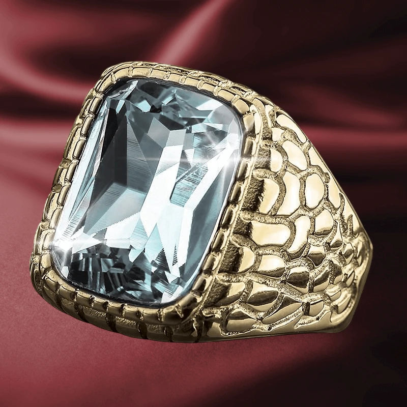 Glacier Ice Ring featuring a large rectangular blue gemstone set in a textured gold-plated stainless steel band designed for men, showcasing bold and elegant jewelry style.