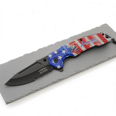 250th Anniversary Patriotic Folding Pocket Knife featuring a black blade with USA 250 Years engraving and a handle decorated in American flag colors and stars and stripes design.