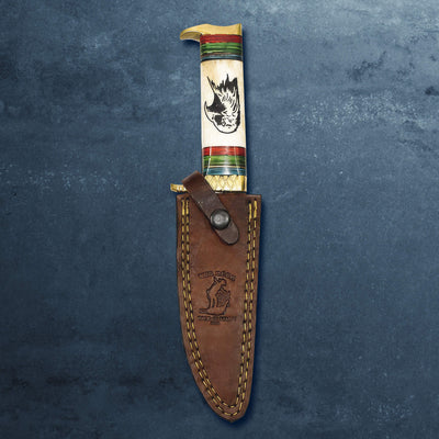 Predator Knife with a decorative multicolor handle featuring animal artwork and a brown stitched leather sheath Up To 75% Off Retail