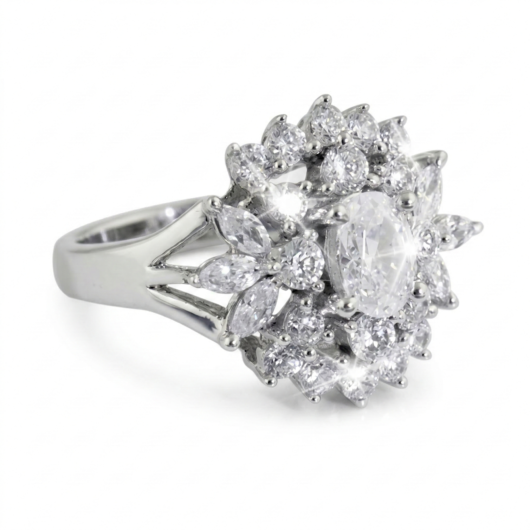 Sterling Silver Cluster Ring for female with an intricate design featuring a large central oval gemstone surrounded by multiple smaller round and marquise-shaped stones in a sparkling arrangement.