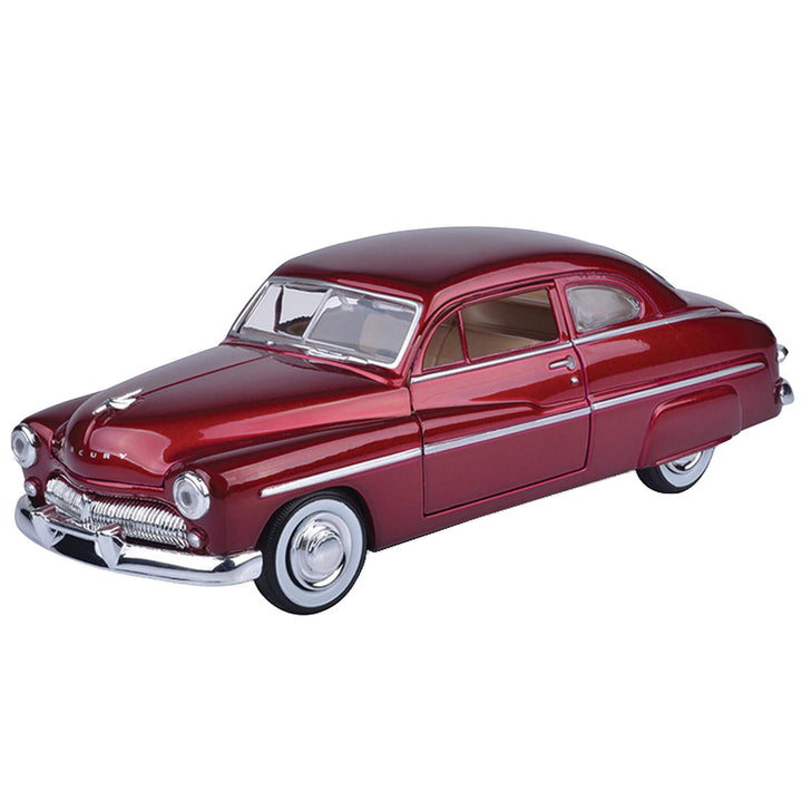 Model of a classic red car on a white background
