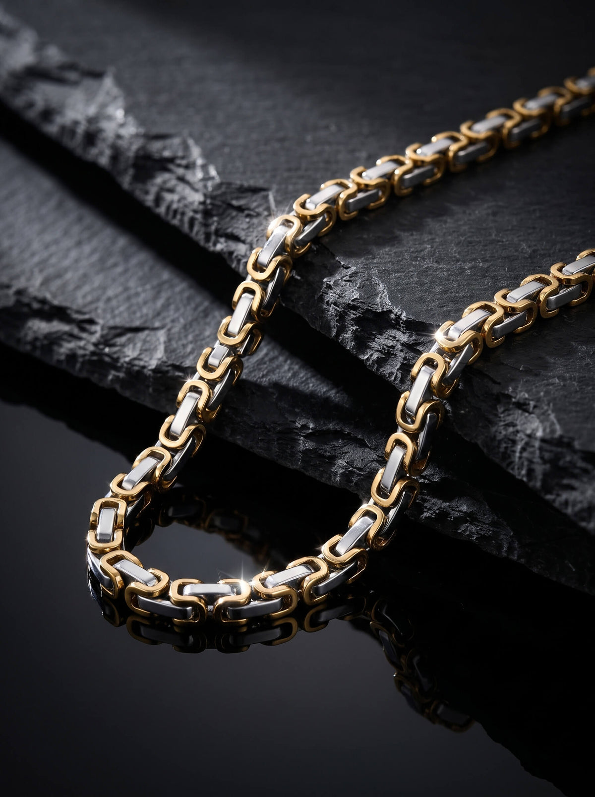 Maximilian Byzantine Necklace featuring gold and silver tone interlocking links on textured black slate with a polished reflective finish Up To 75% Off Retail