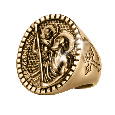 St. Christopher Ring in a gold tone featuring a detailed St. Christopher and child relief, textured oval face, beaded border, and cross accent on the side
