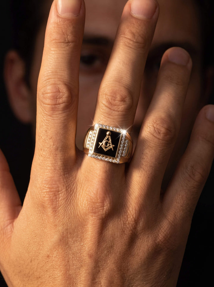 Keystone Men's Ring with black center, silver toned detailing, and star emblem worn on a hand. Up To 75% Off Retail.