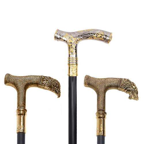 Three ornate walking sticks with decorative handles on a white background