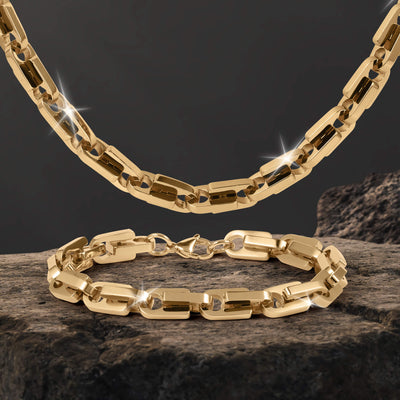 Moderna Link Collection gold link necklace and matching bracelet displayed on textured stone with polished geometric links Up To 75% Off Retail