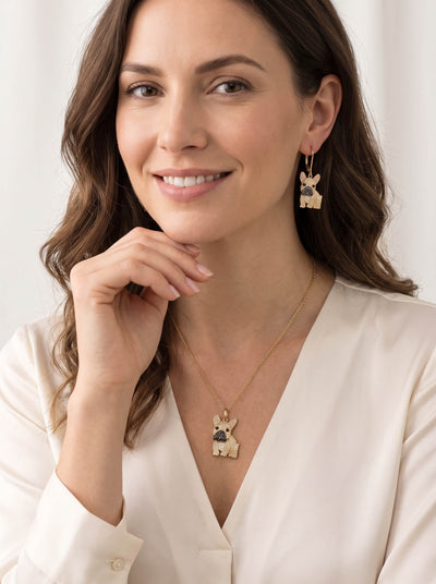 Forever Frenchie Earrings shown on a smiling woman wearing French bulldog drop earrings and a matching pendant necklace Up To 75% Off Retail