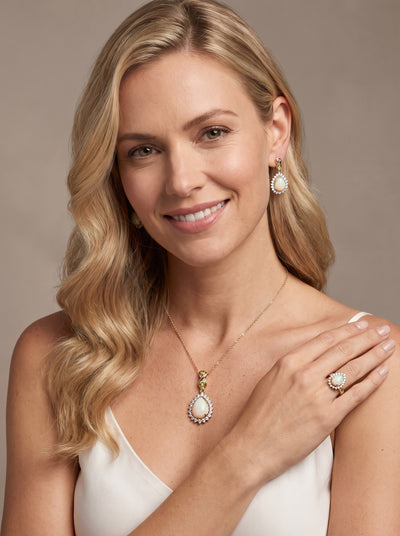 Model wearing Opal Dew Drop Earrings with matching teardrop pendant necklace and ring Up To 75% Off Retail