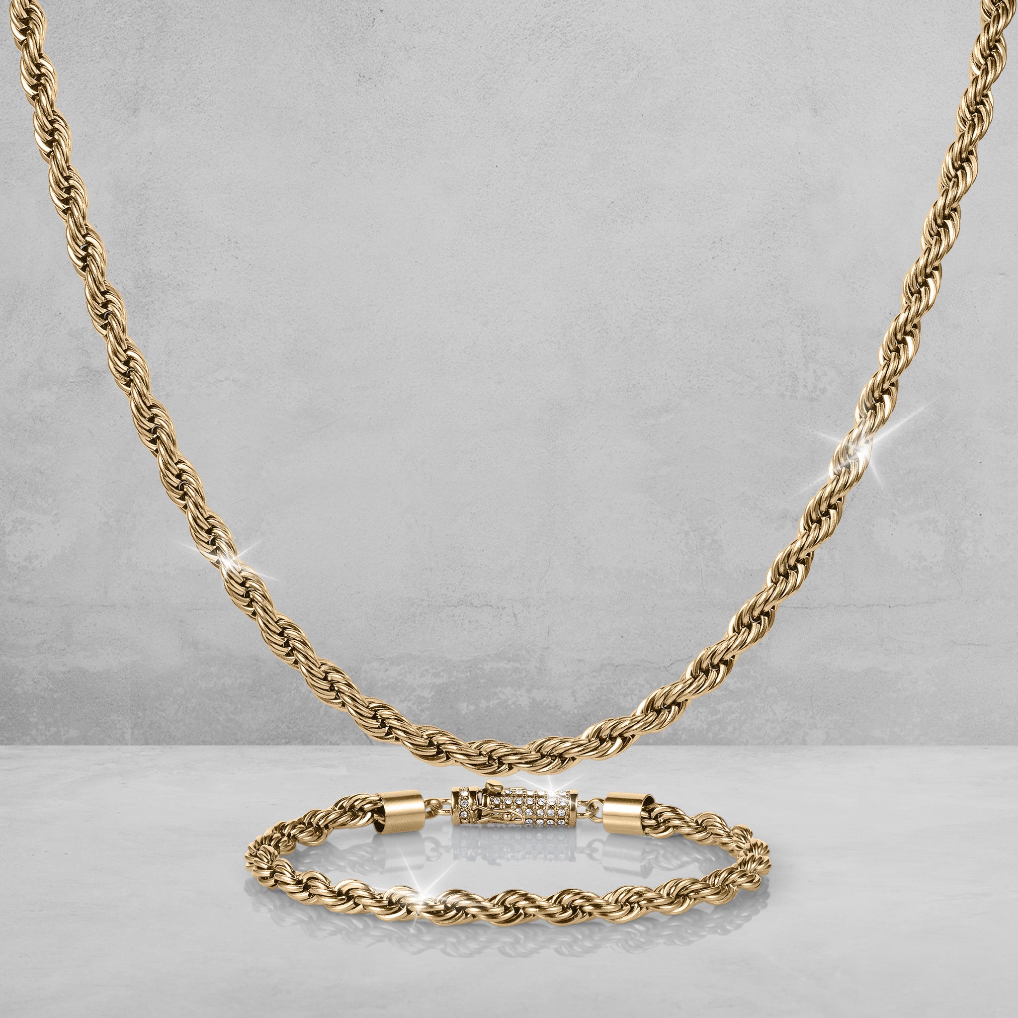 Viper Twist Rope Collection featuring a gold tone twisted rope necklace and matching bracelet displayed on a gray background Up To 75% Off Retail