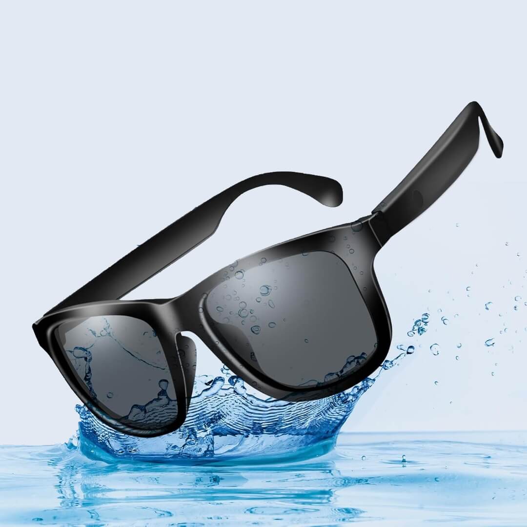 Black smart sunglasses with water droplets on a blue water background