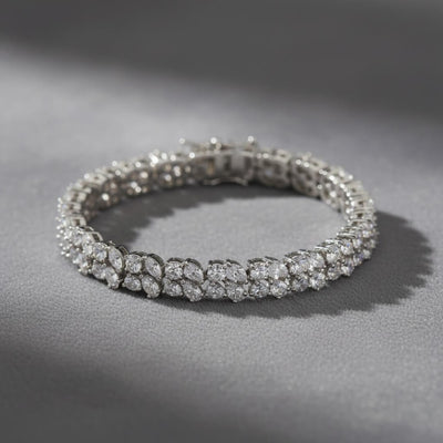Diamond bracelet on a gray surface. Versailles bracelet by Daniel Steiger.