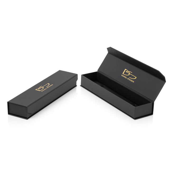 Black luxury jewelry box with gold DS logo, designed for packaging the Turquoise and Tiger's Eye Bracelet made from gems with gold plating for women.