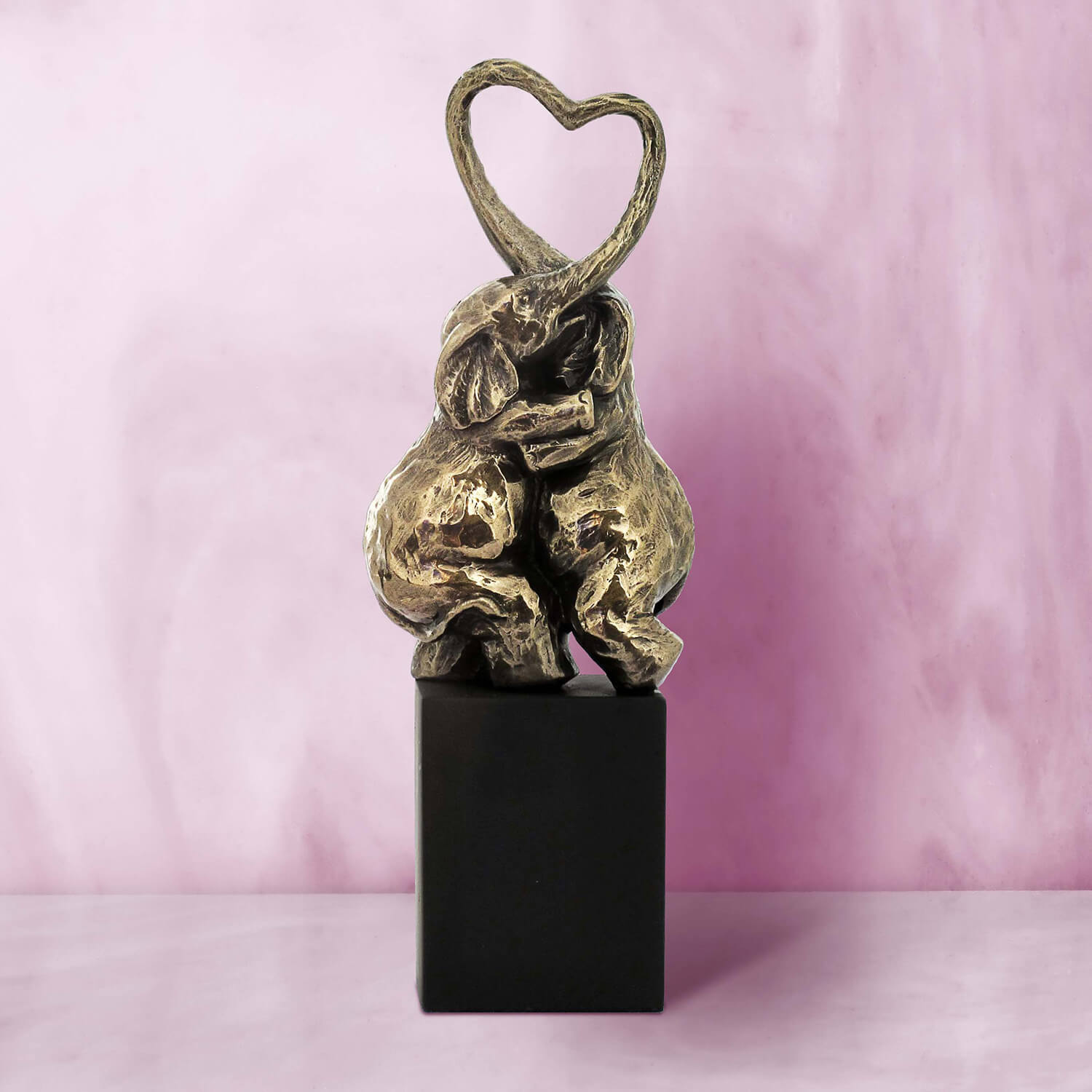 Daniel Steiger Elephants Embrace Statue