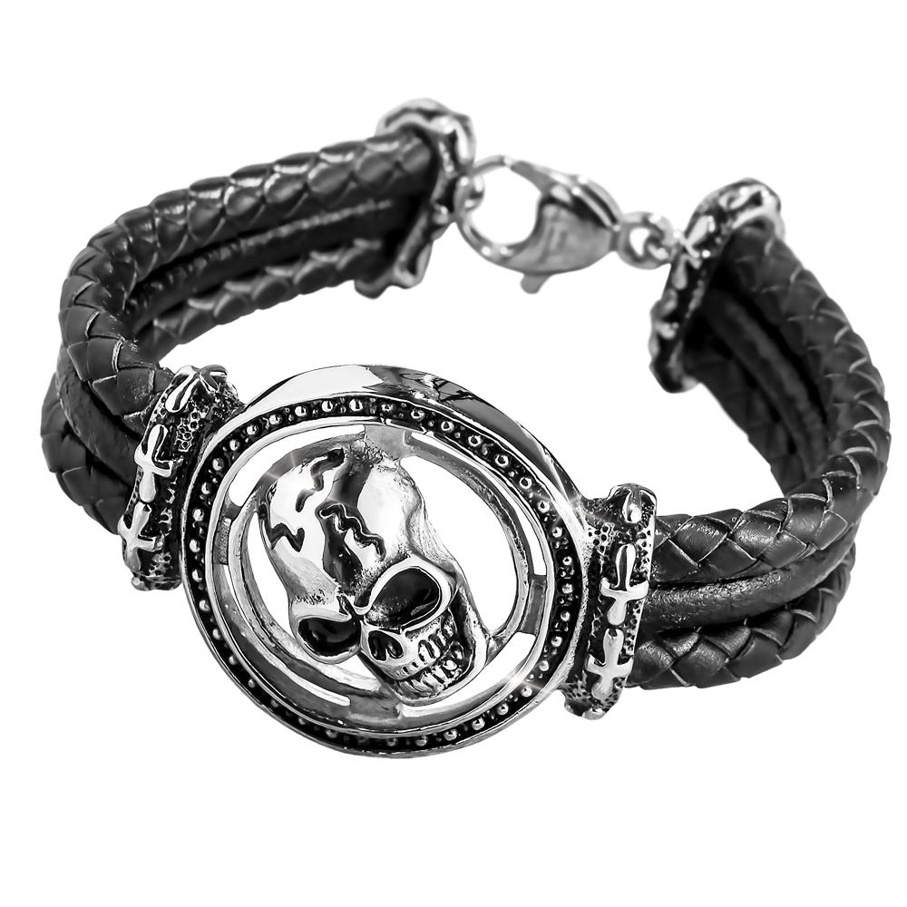Skull Arena Steel Bracelet featuring a detailed stainless steel skull centerpiece with black braided leather straps, designed for male jewelry enthusiasts.