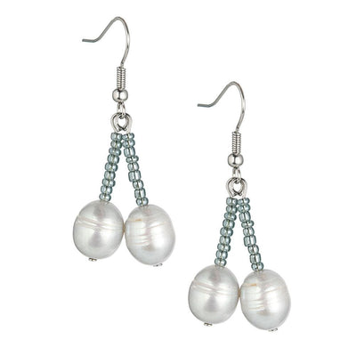 Dove Silver Pearl Earrings featuring two lustrous pearls hanging from delicate silver hooks with a strand of small silver beads, designed for women seeking elegant jewelry.