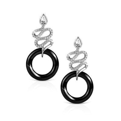 Ceramica Serpent Earrings featuring a sterling silver rhodium-plated serpent design adorned with clear stones, paired with a glossy black circular ceramic element for women’s jewelry.