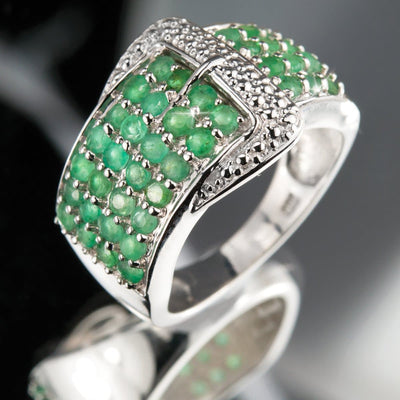 Emerald Buckle Ring crafted in sterling silver with rhodium plating, featuring a buckle design adorned with vibrant green emerald gemstones for a refined female jewelry piece.