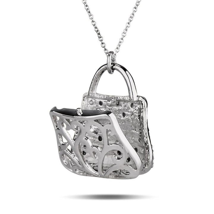 Sterling silver pendant shaped like a small handbag with ornamental cutout design, plated in rhodium, hanging from a delicate chain, Passarela Bag jewelry for female.
