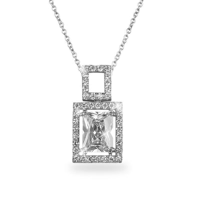 Imperial Peninsula Pendant featuring a sterling silver chain with a square-cut clear gemstone surrounded by smaller sparkling stones, designed for women’s jewelry.