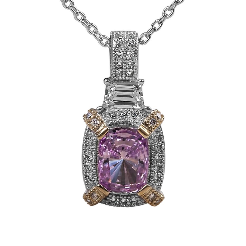 Dahlia Blossom Pendant featuring a sterling silver two-tone design with a central pink gemstone surrounded by sparkling accents on a delicate chain, elegant jewelry for women.