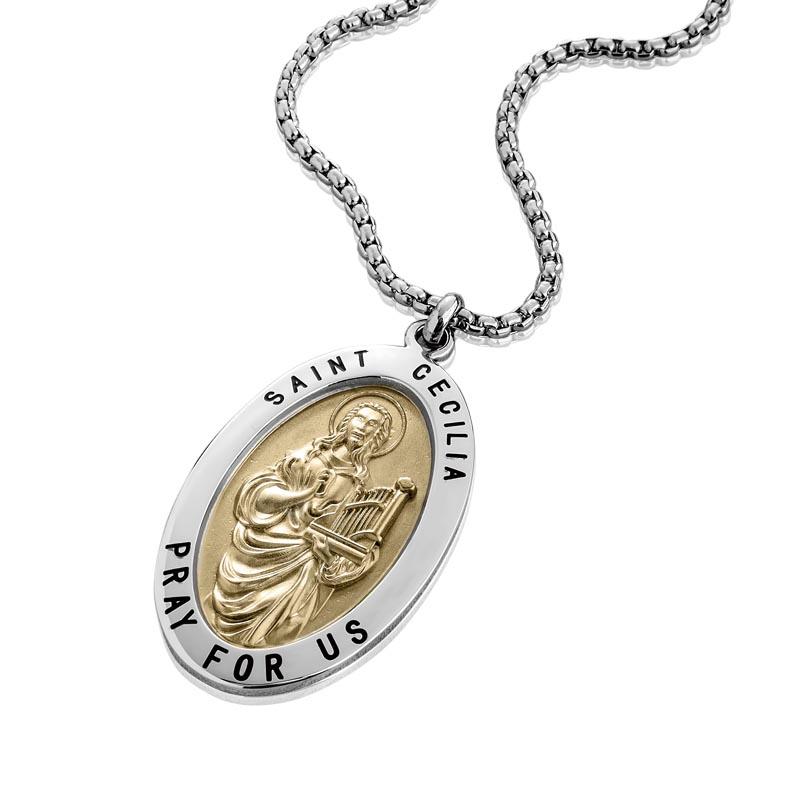 St Cecilia Pendant featuring a two-tone stainless steel design with an engraved image of Saint Cecilia holding a harp and the inscription 