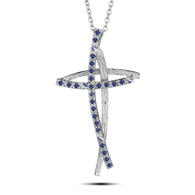 Decoria Rhodium Cross Pendant featuring intertwined textured rhodium plating accented with blue gemstones, designed for women as an elegant jewelry necklace piece.
