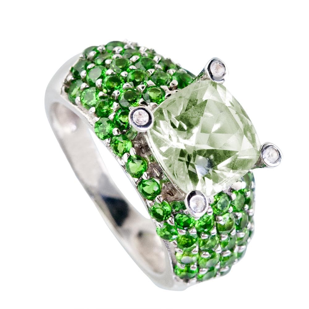 Apple Martini Ring featuring sterling silver with rhodium plating, adorned with a large pale green central gemstone and multiple small vibrant green stones, designed for women’s jewelry.
