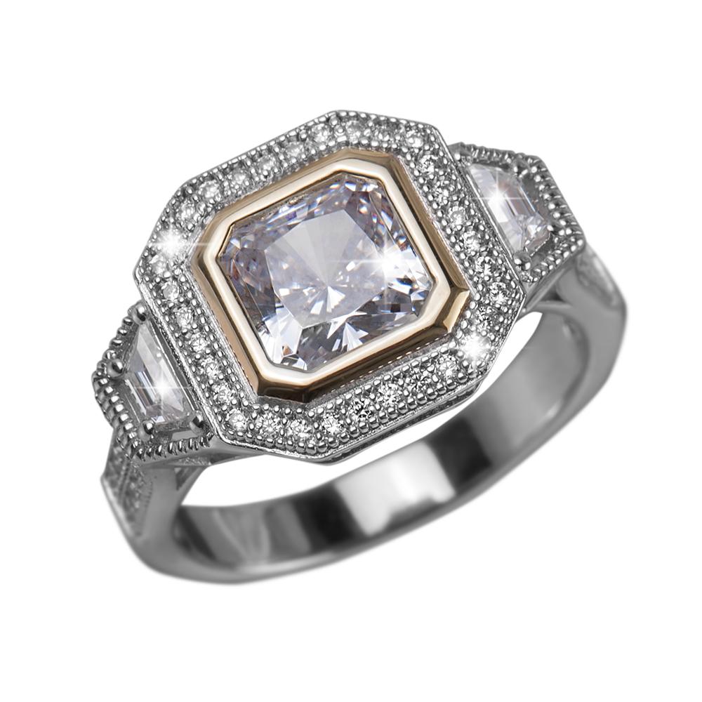 Dakota Ring featuring a two-tone sterling silver band with intricate detailing and a large central square-cut gemstone flanked by smaller stones, designed for women.